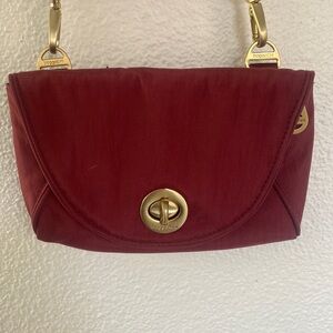Baggalini wine color canvas crossbody bag